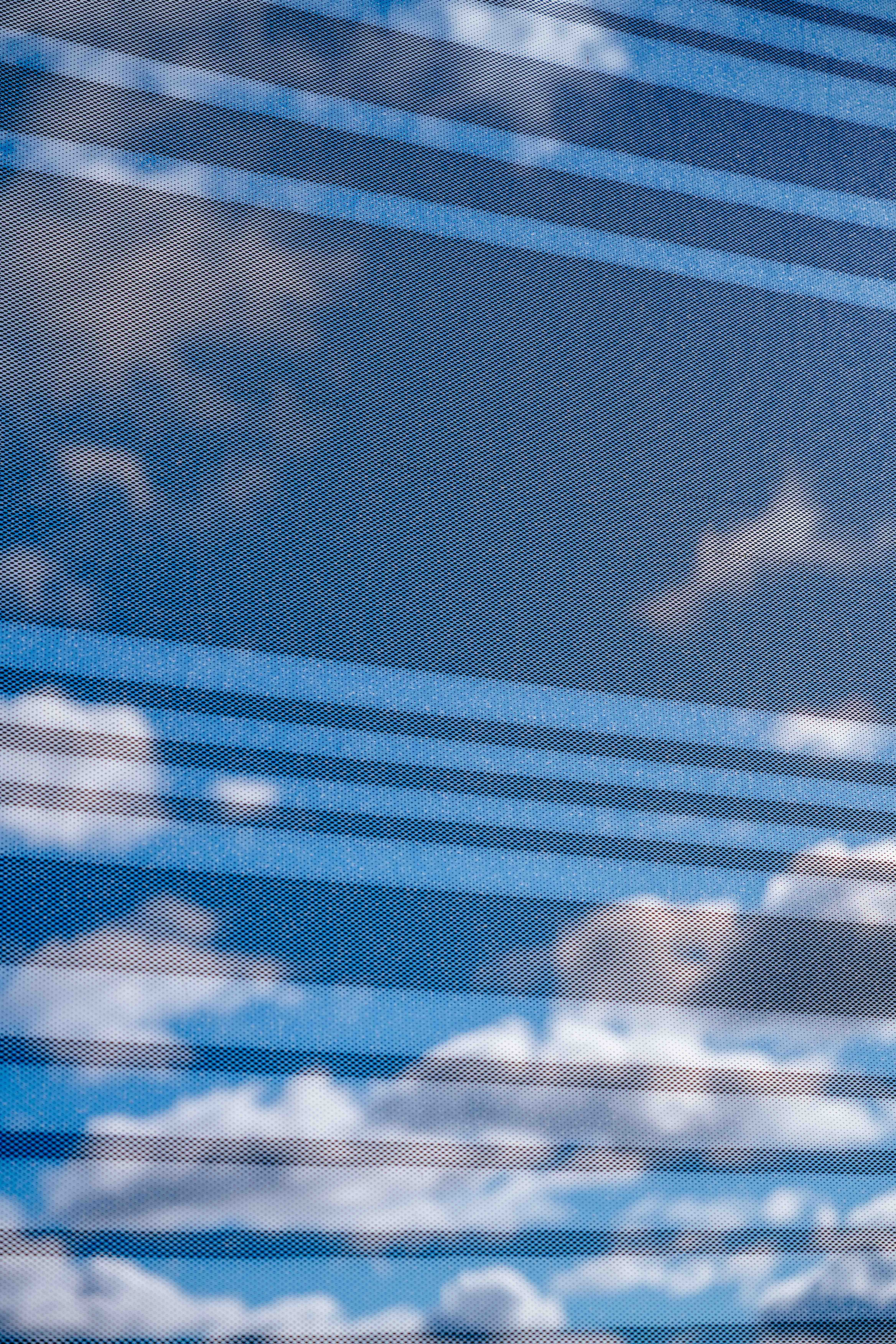 Glass banding on the exterior windows includes the patent numbers of historic innovations in company history.   